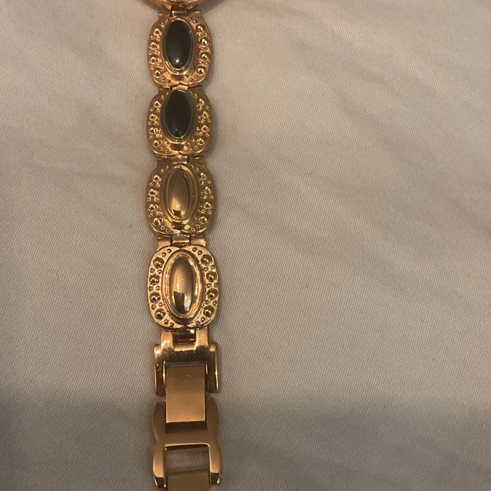Elegant Gold and Black Women's Watch